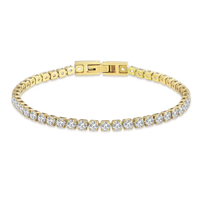 Gold bracelet with diamond accents on a white background
