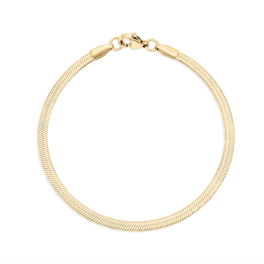 Gold bracelet on a white background
