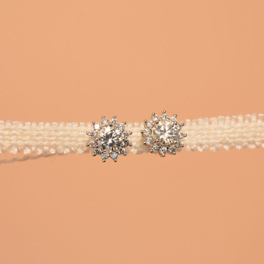 Pearl belt with silver embellishments on a beige background